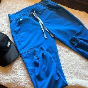 Figs cap and jogger. Very good condition. Selling as bundle.